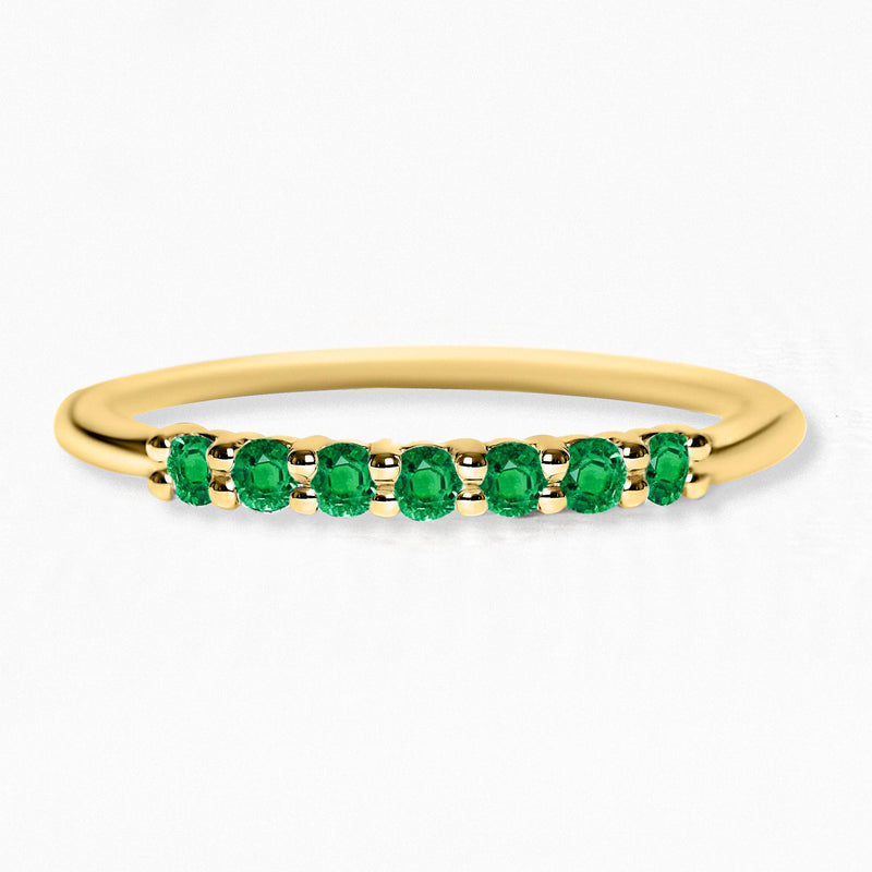 Yellow gold vadha ring set with 7 emeralds