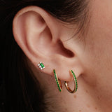 emerald hoops and Prana baguette emerald and diamond earrings