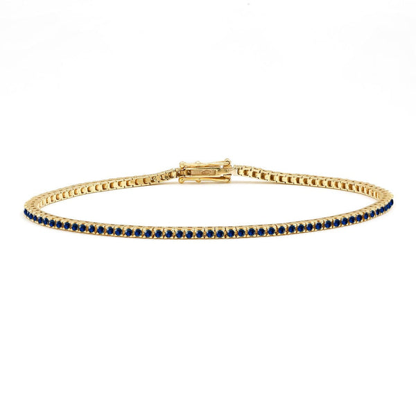 Sapphire and 18ct yellow gold tennis bracelet