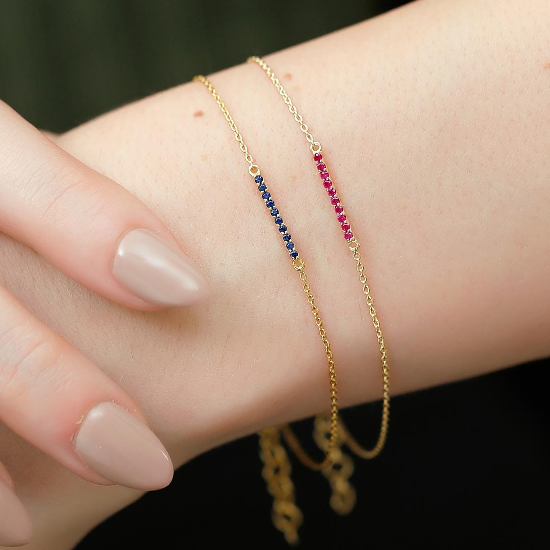 Three long gemstone bracelets
