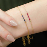 Three long gemstone bracelets