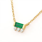 Prana emerald and diamond baguette necklace in yellow gold