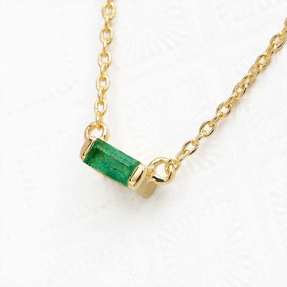 Shanti emerald baguette necklace in yellow gold side view