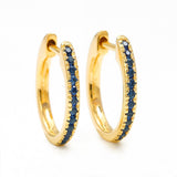 Sapphire paved Ujala hoop earrings in yellow gold