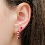 combination of creole ruby earrings and solitaire ruby earrings